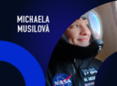 portrait of Dr. Musilova in blue background with blue semicircle in the left corner